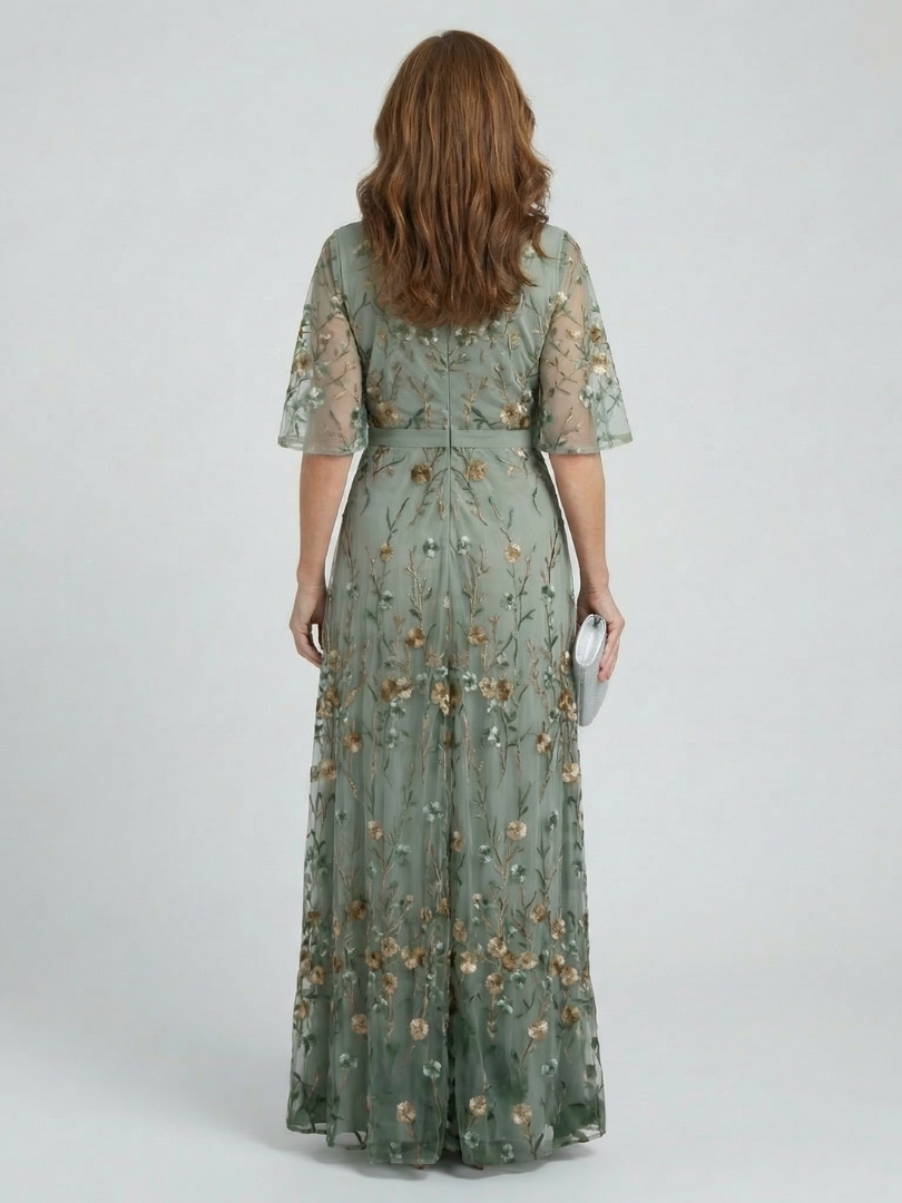 Robe longue maxi Halter Bloom Flow verte sage de Danoir Paris, style élégant avec détails floraux.