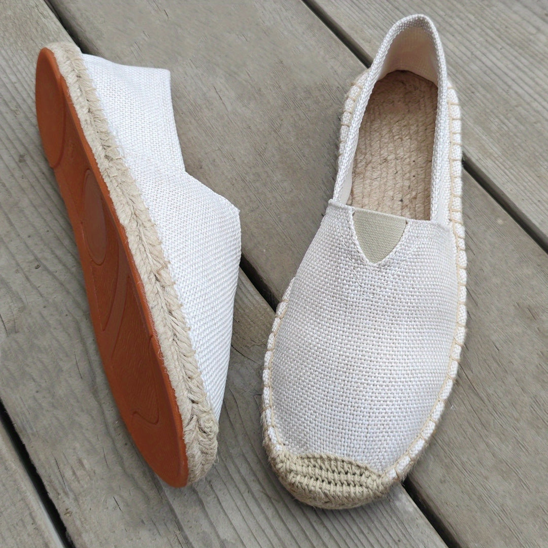 Espadrilles élégantes pour hommes de la marque Danoir Paris, chaussures blanches en toile avec semelle en corde.