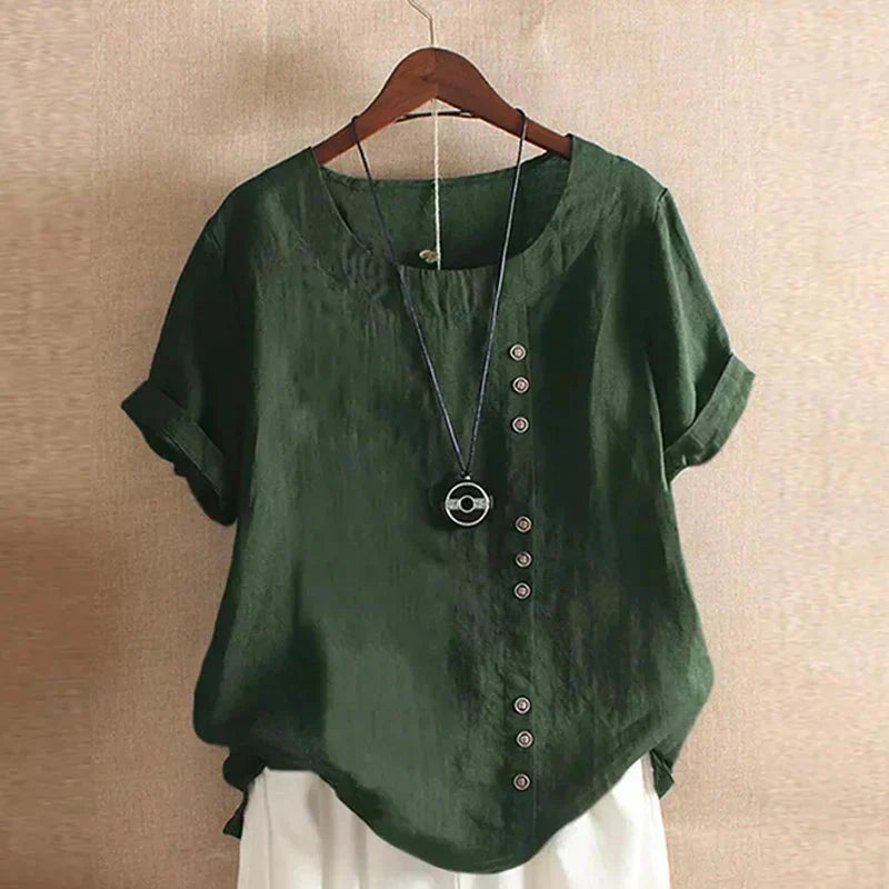 Chemise décontractée rose Laura de Danoir Paris, élégante blouse pour femme avec coupe fluide et détails soignés.