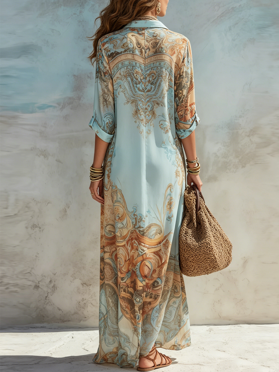 Robe longue d'été fluide à manches courtes de Danoir Paris, style baroque, couleur bleu, élégante et légère.