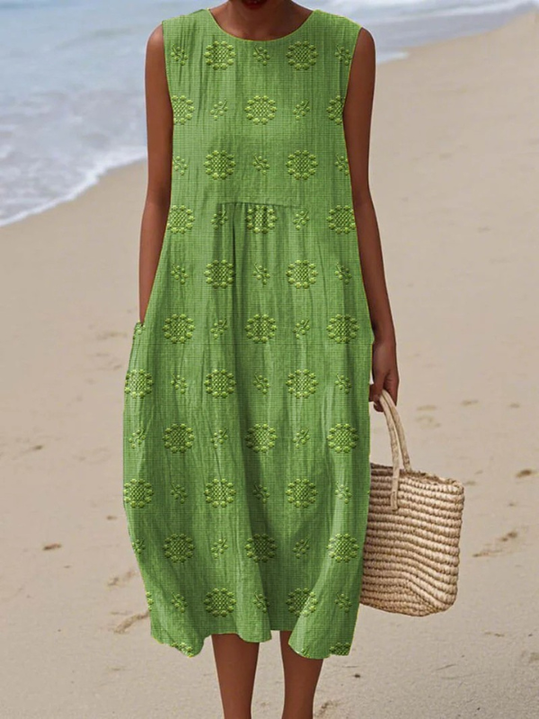 Robe midi sans manches Lucille de Danoir Paris, broderie rose élégante, tissu léger et fluide pour femme.