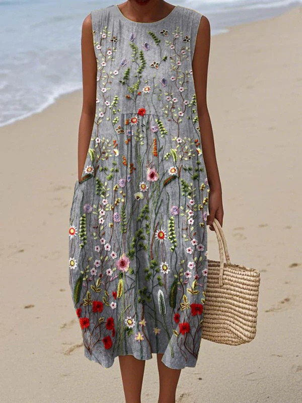 Robe midi sans manches Danoir Paris Cara Wildflower, motif floral multicolore, tissu léger et élégant pour l'été.