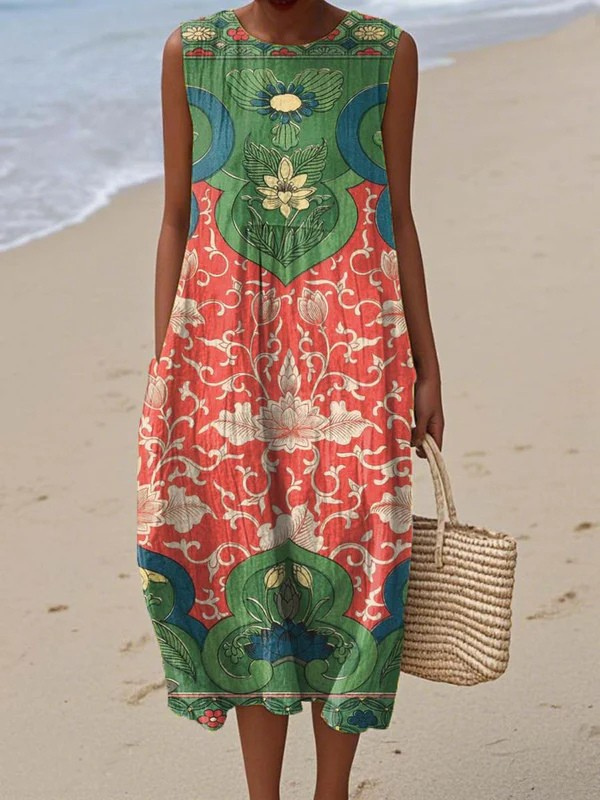 Robe midi bohème sans manches de Danoir Paris, modèle Vera, avec motif multicolore, longueur mi-mollet, style élégant et décontracté.