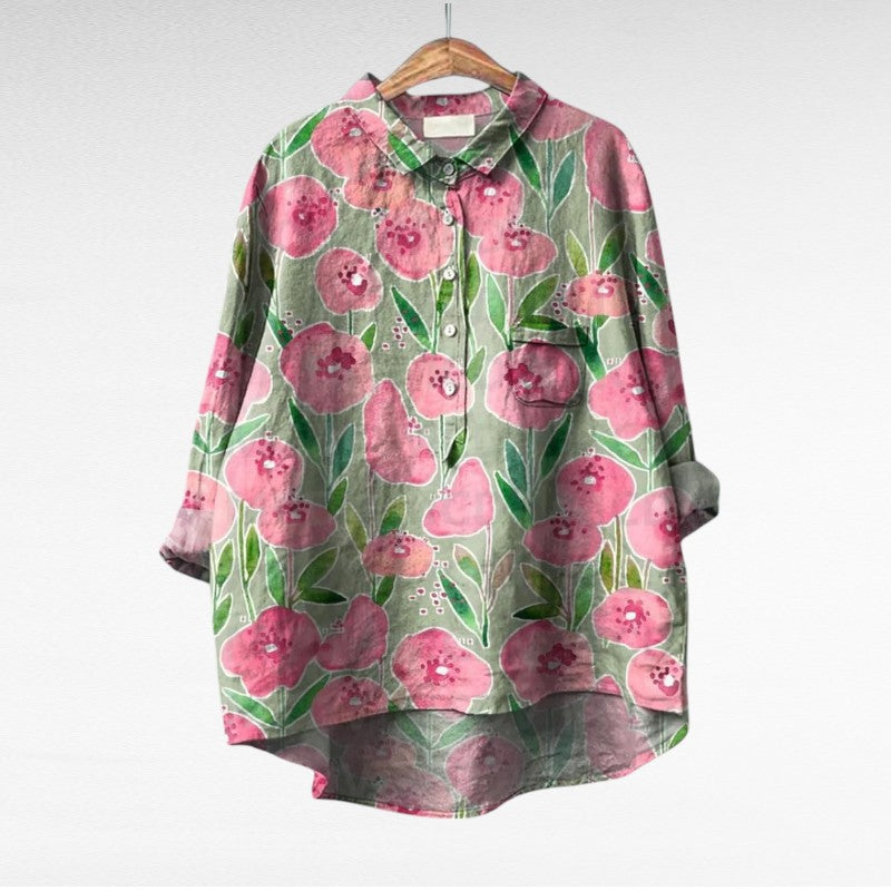 Blouse élégante en lin Thérèse de Danoir Paris, design léger et stylé, idéale pour l'été, en tissu blanc avec motifs subtils.