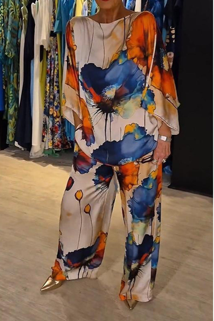 Costume polyvalent élégant Danoir Paris Jade en bleu marine, veste et pantalon pour femmes, style sophistiqué et moderne.