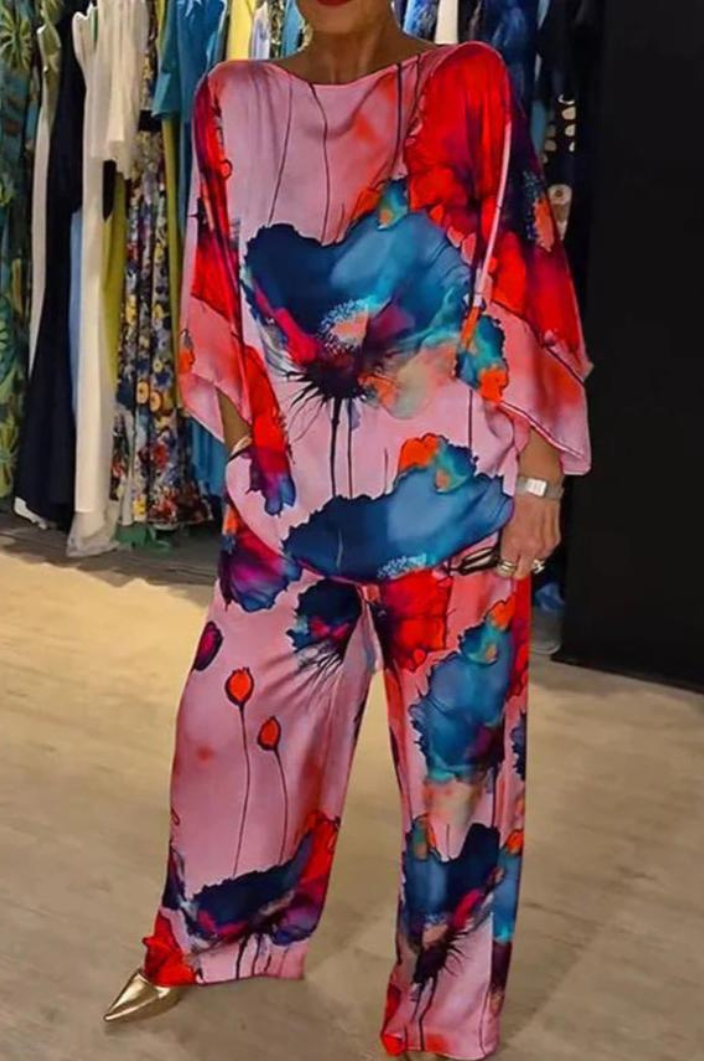 Costume polyvalent élégant Danoir Paris en bleu marine, veste et pantalon pour femmes, parfait pour diverses occasions.