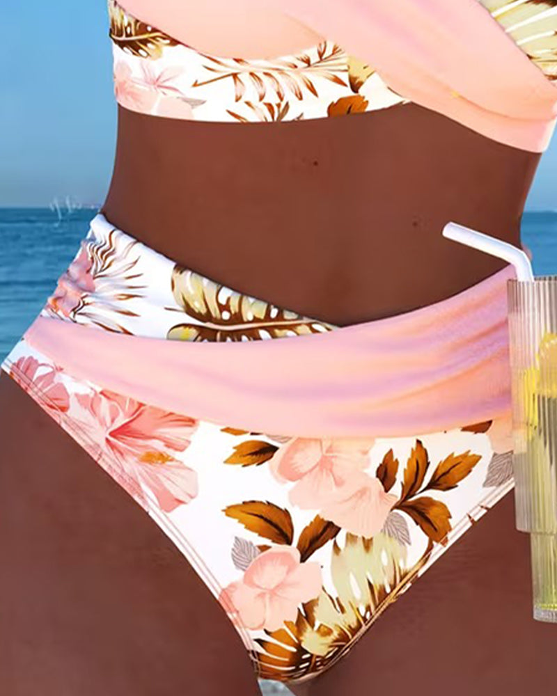 Maillot de bain Danoir Paris Eduarda avec motif floral contrasté et fente, en tissu rose, pour un look élégant et tendance.