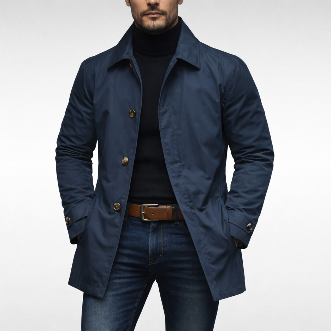 Manteau trench élégant gris Danoir Paris pour femme, coupe classique et tissu sophistiqué visible sur l'image.