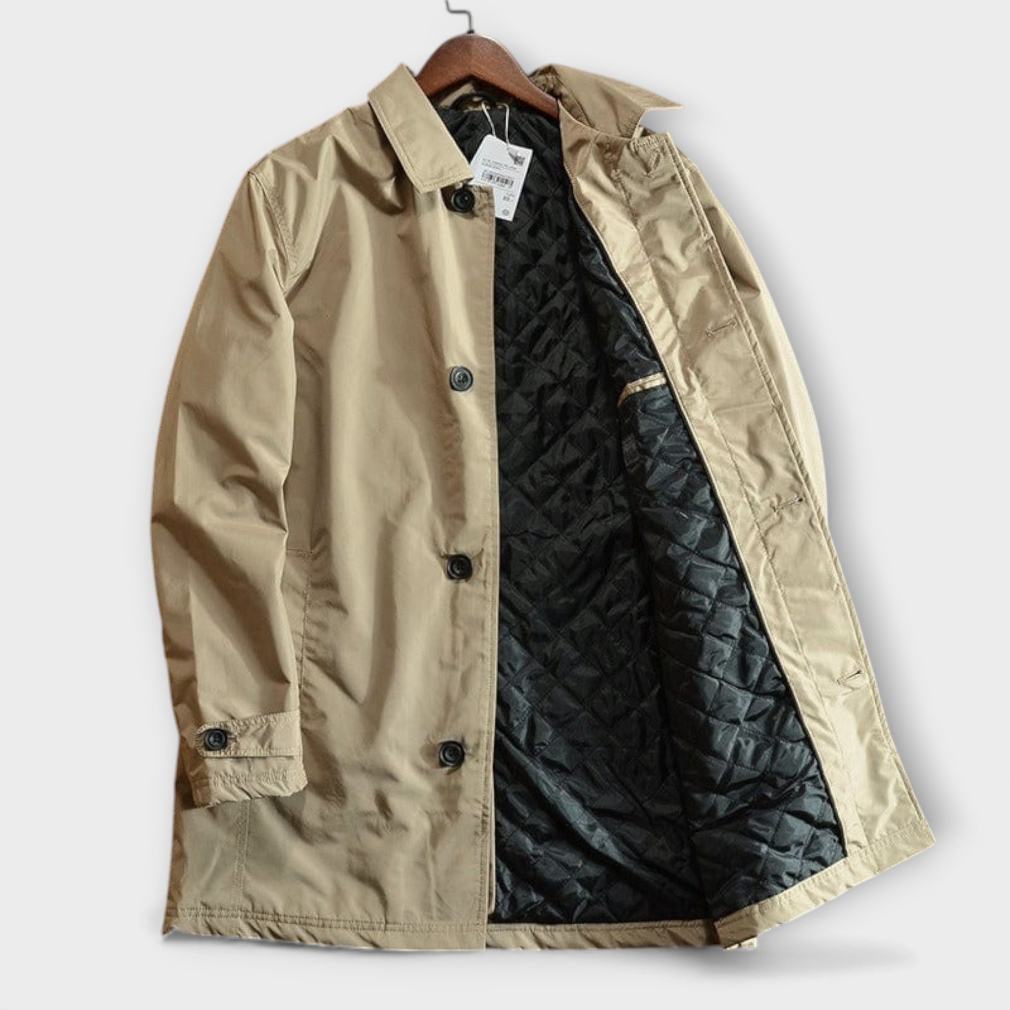 Manteau trench élégant gris de Danoir Paris, coupe sophistiquée, vue de face, tissu léger et finition soignée.