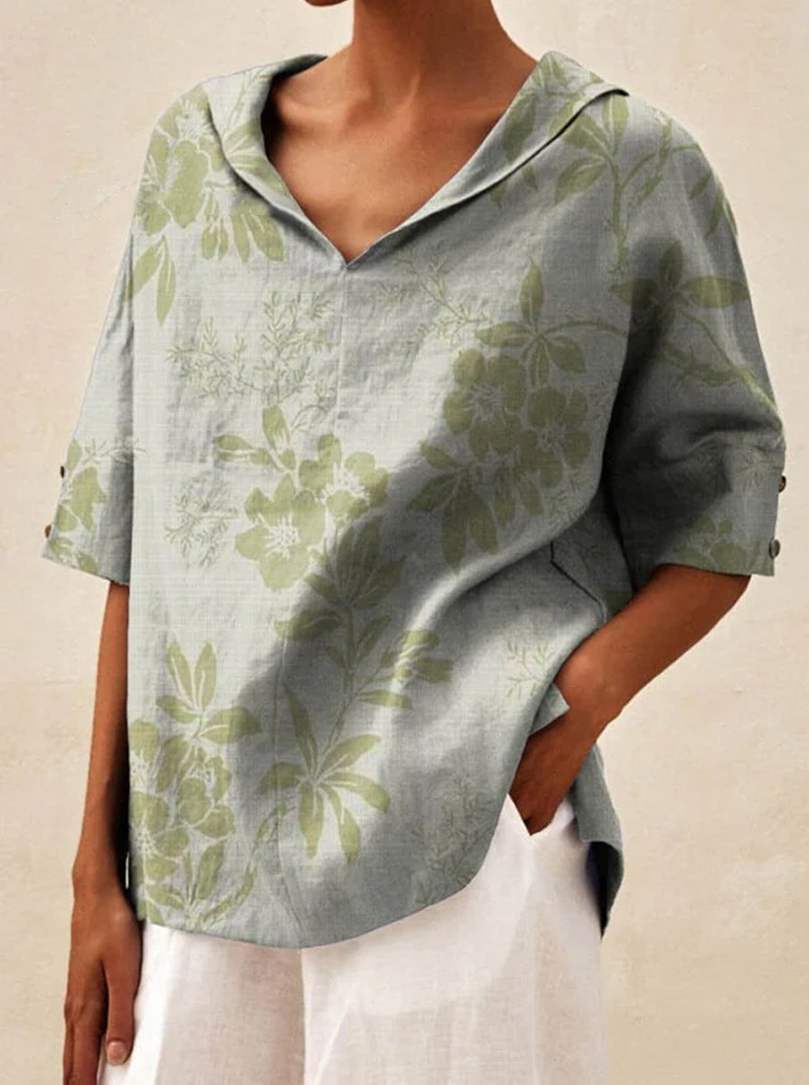 Haut léger floral estival Andrea de Danoir Paris, blouse blanche légère avec motif floral, parfaite pour l'été.