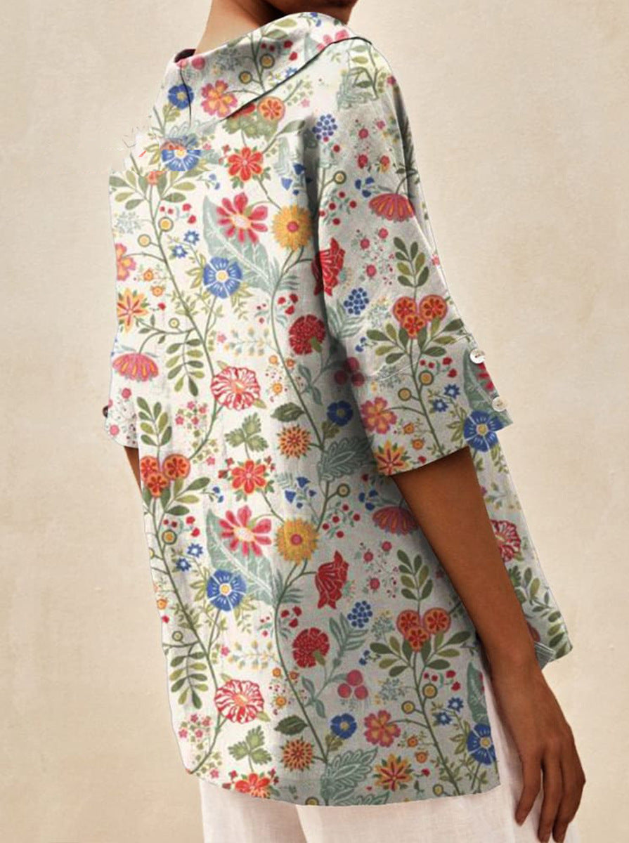 Haut léger floral estival Andrea de Danoir Paris, blouse blanche avec motif floral, tissu léger et élégant.