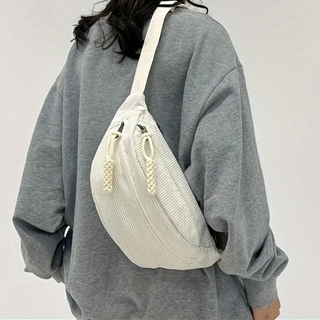 Sac à bandoulière Petra en velours côtelé vert de Danoir Paris, élégant et tendance, visible avec détails en velours côtelé.