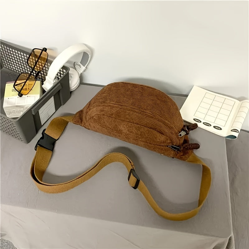 Sac à bandoulière Danoir Paris Petra en velours côtelé vert, avec poignée et détails élégants.