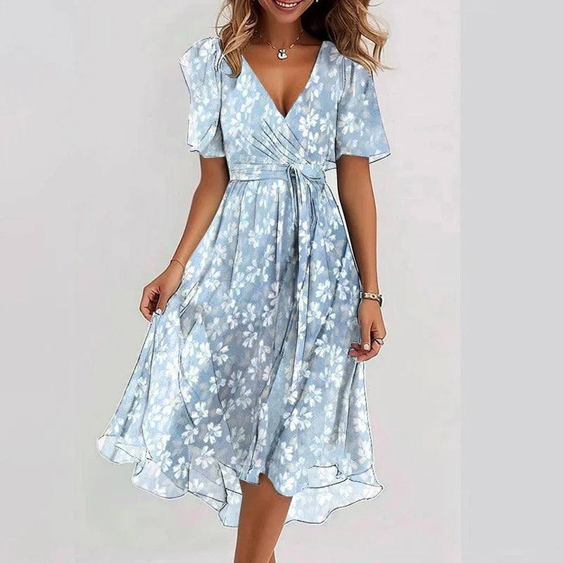 Robe florale élégante Yara de Danoir Paris en tissu vert clair, vue de face avec détails de la coupe et du motif floral.