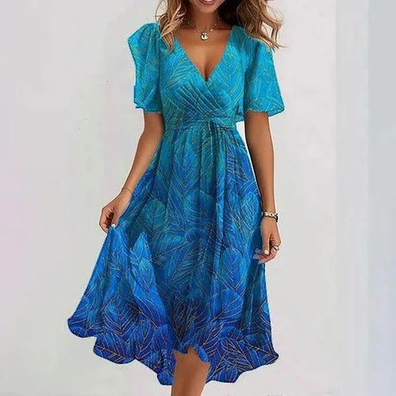 Robe florale élégante Yara de Danoir Paris, couleur vert clair, détail de la robe sophistiquée et légère pour femme.