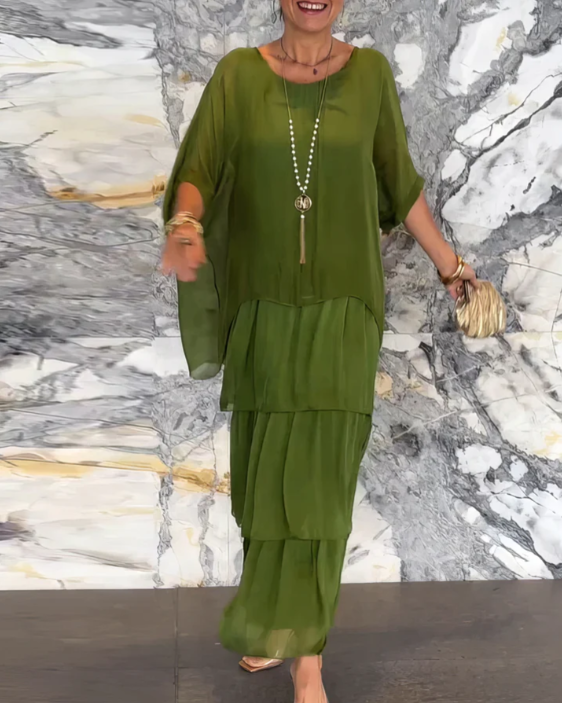 Robe longue fluide élégante Danoir Paris Lara en tissu vert délavé, vêtement féminin sophistiqué et confortable.
