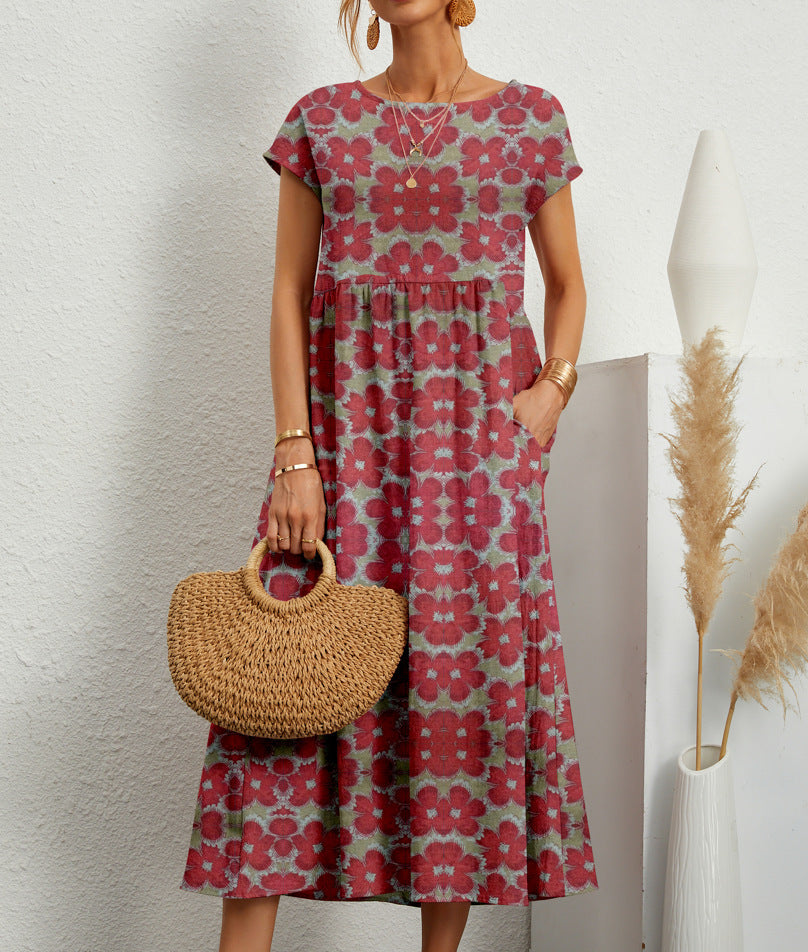 Robe florale élégante Deborah de Danoir Paris en tissu vert foncé, détail de la robe avec motif floral sophistiqué.