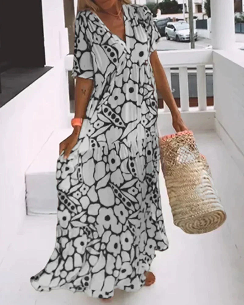 Robe d'été légère Christine de Danoir Paris en tissu vert avec détails élégants.