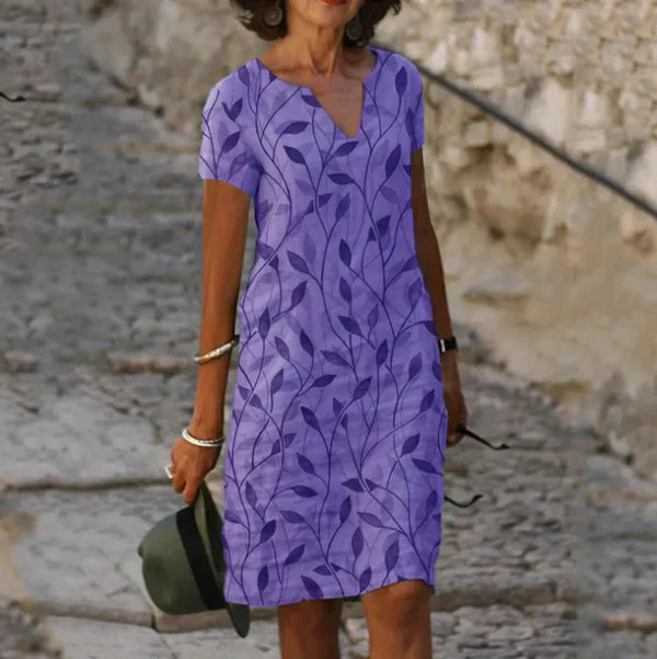 Robe midi chic verte Danoir Paris Avery, élégante avec détails sophistiqués, portée fluide et moderne, vue de face.