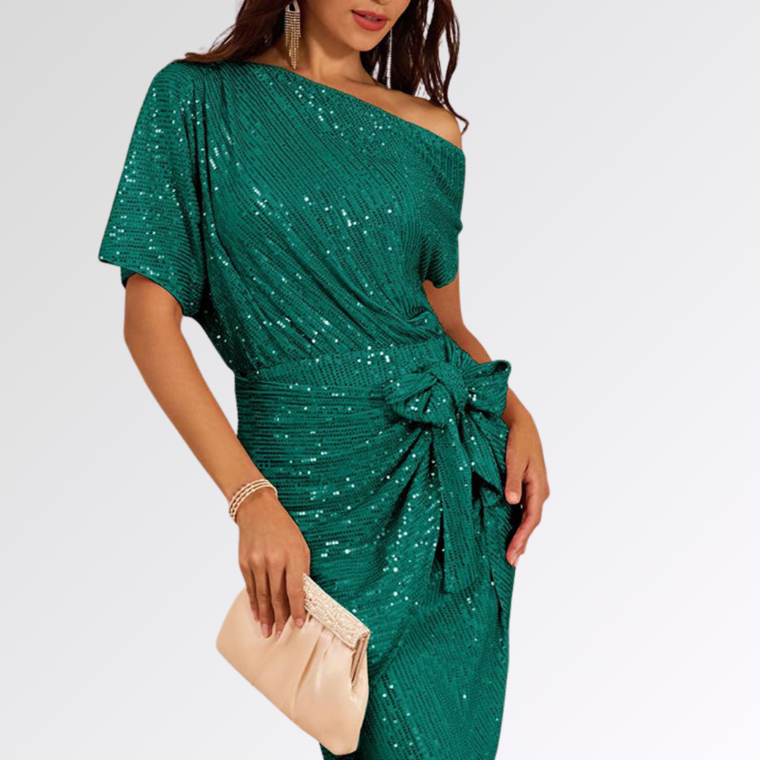 Robe asymétrique scintillante verte Danoir Paris, élégante et brillante, pour une allure sophistiquée et moderne.