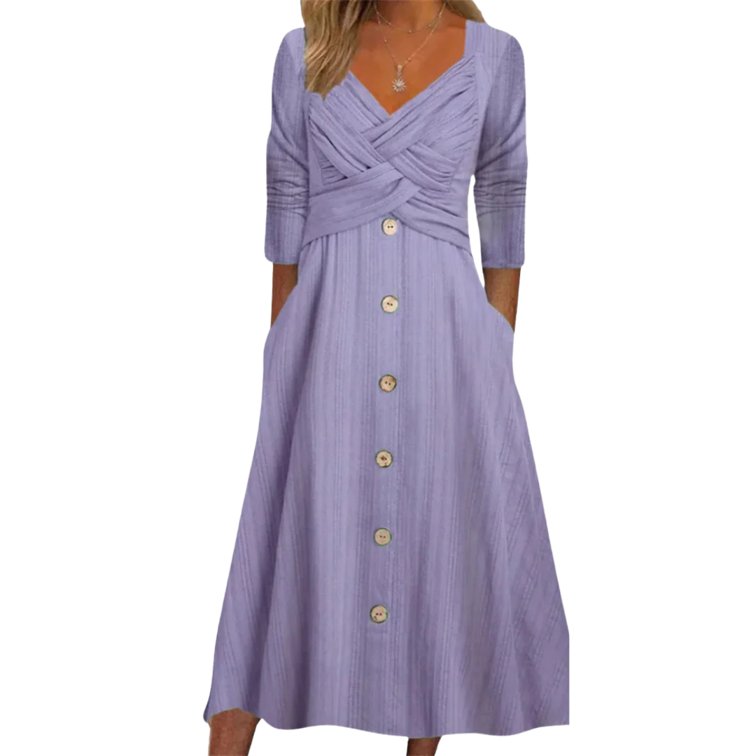 Robe élégante Ella de Danoir Paris en vert avec couverture du ventre, tissu fluide et détails sophistiqués.