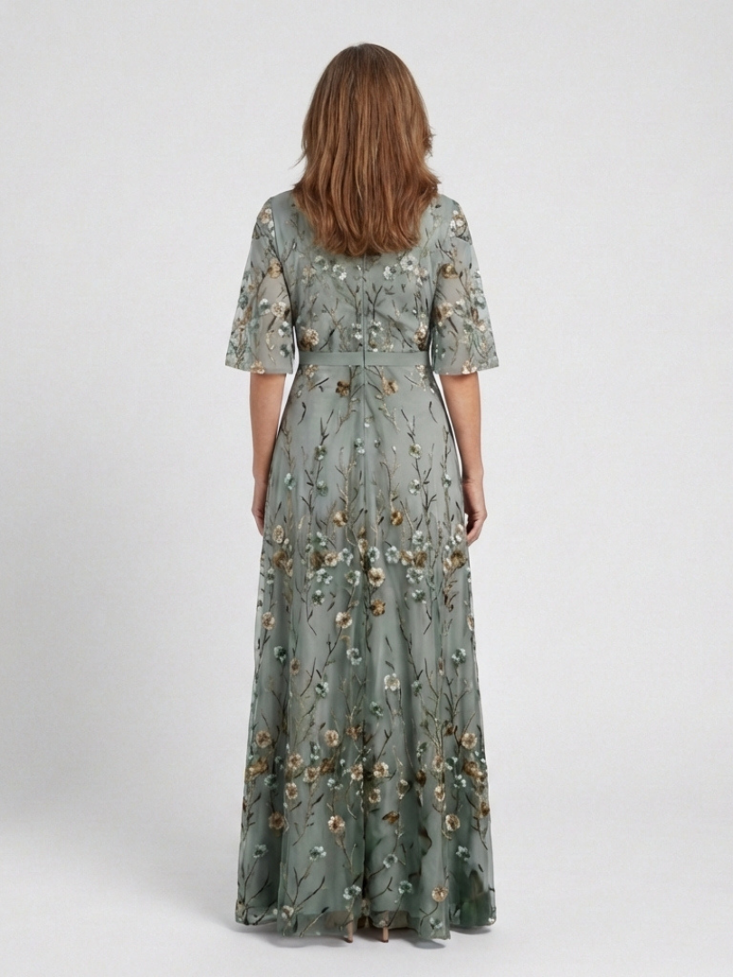 Robe longue fleurie Danoir Paris Élodie avec col en V, tissu vert, style élégant et fluide pour femme.