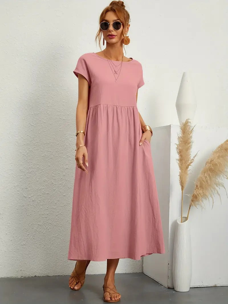 Robe douce et élégante Jeane de Danoir Paris en tissu vert, portée par un mannequin, vue de face.