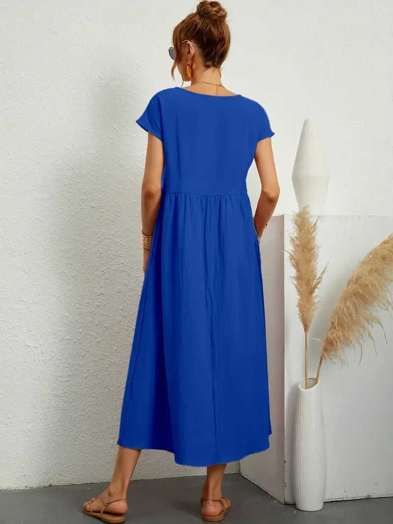 Robe douce et élégante Jeane de la marque Danoir Paris, couleur verte, tissu fluide et style raffiné.