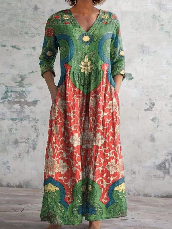 Robe maxi florale élégante Judith de Danoir Paris, en tissu vert avec motifs floraux, portée sur mannequin.