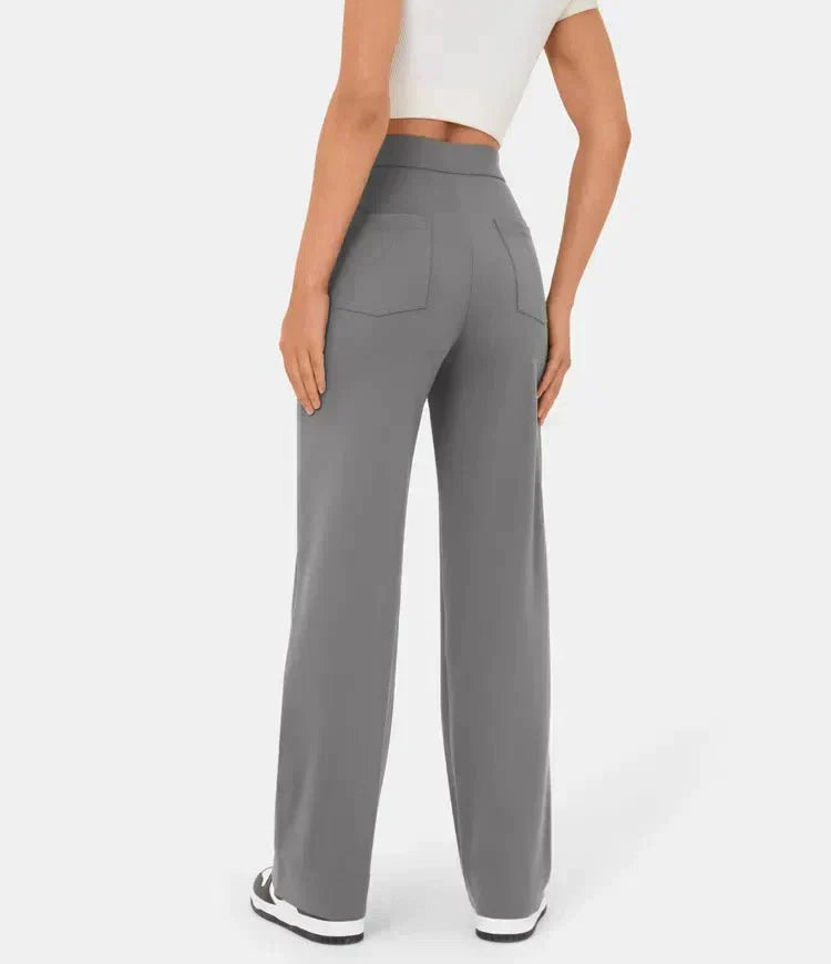 Pantalons élastiques confortables Jade de Danoir Paris, tissu vert doux, taille XS, style décontracté et moderne.