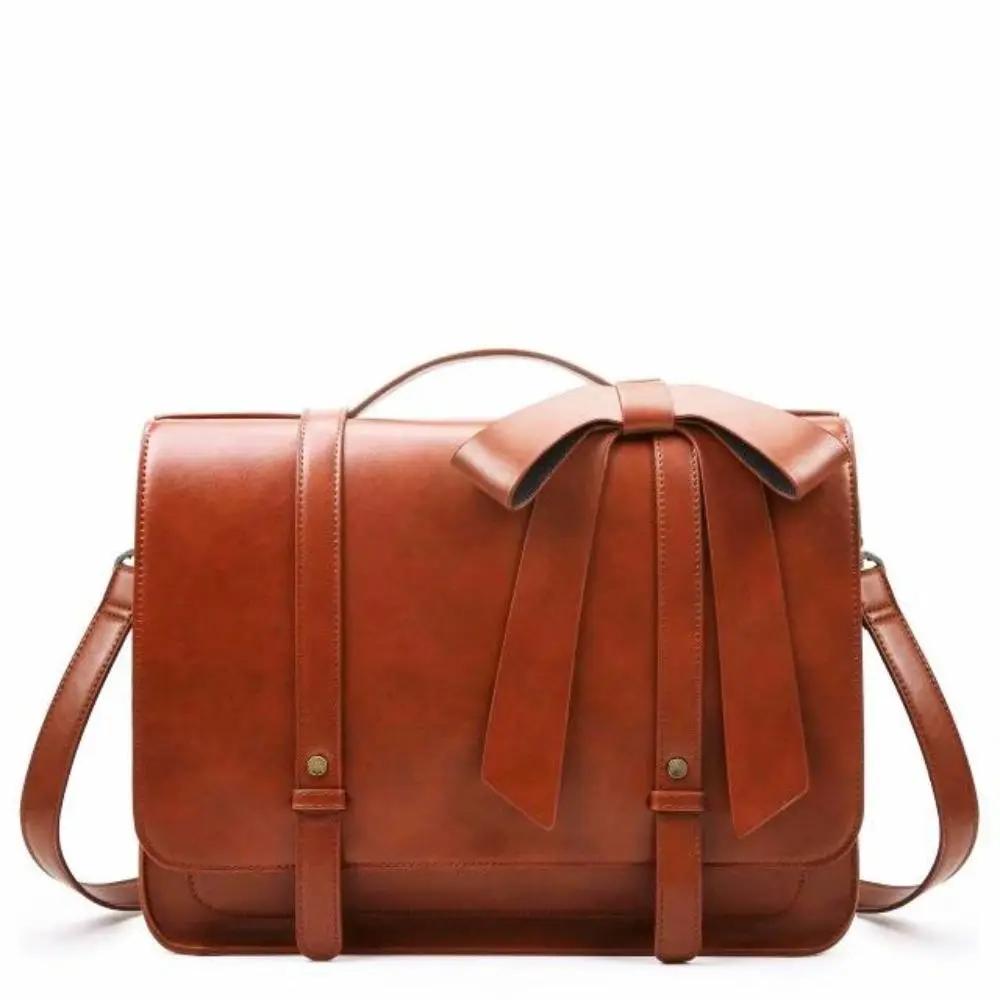 Sac rétro Knoten Twist Danoir Paris en bleu et rose, petit sac à main avec design vintage et détails élégants.