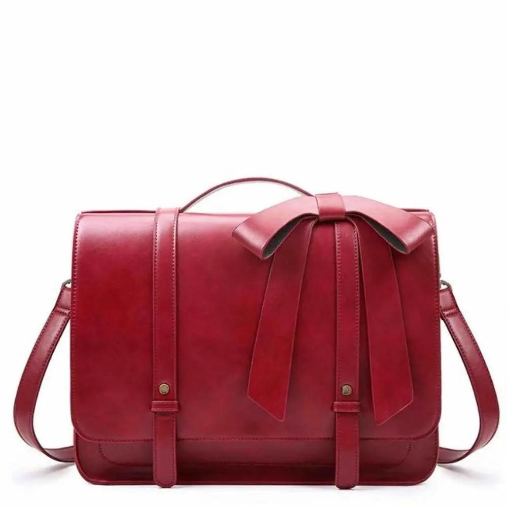 Sac rétro Knoten de Danoir Paris en bleu et rose, élégant sac à main avec design twist et finition vintage.