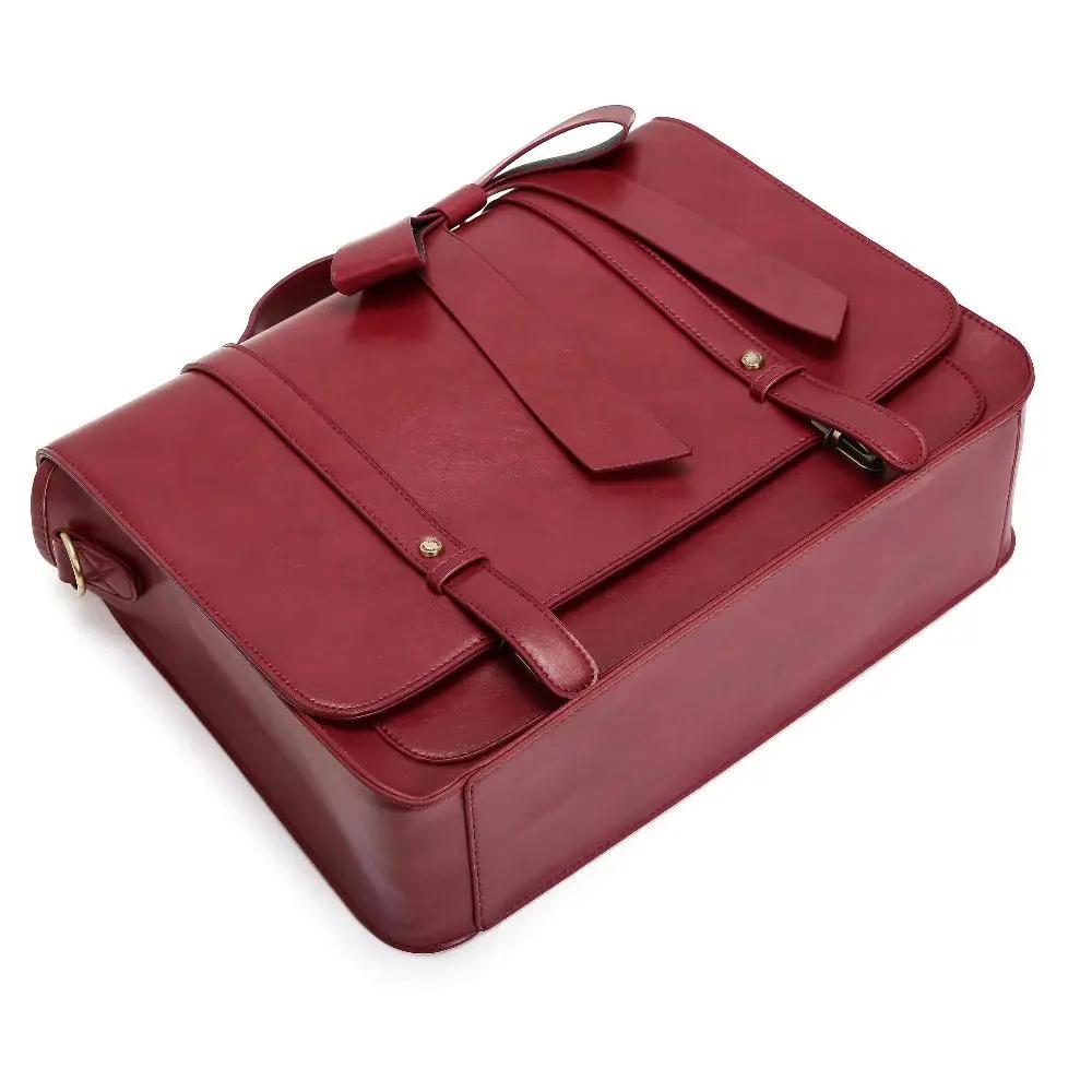 Sac rétro Knoten Twist en bleu-rose de Danoir Paris, sac à main élégant avec design vintage et détails colorés.