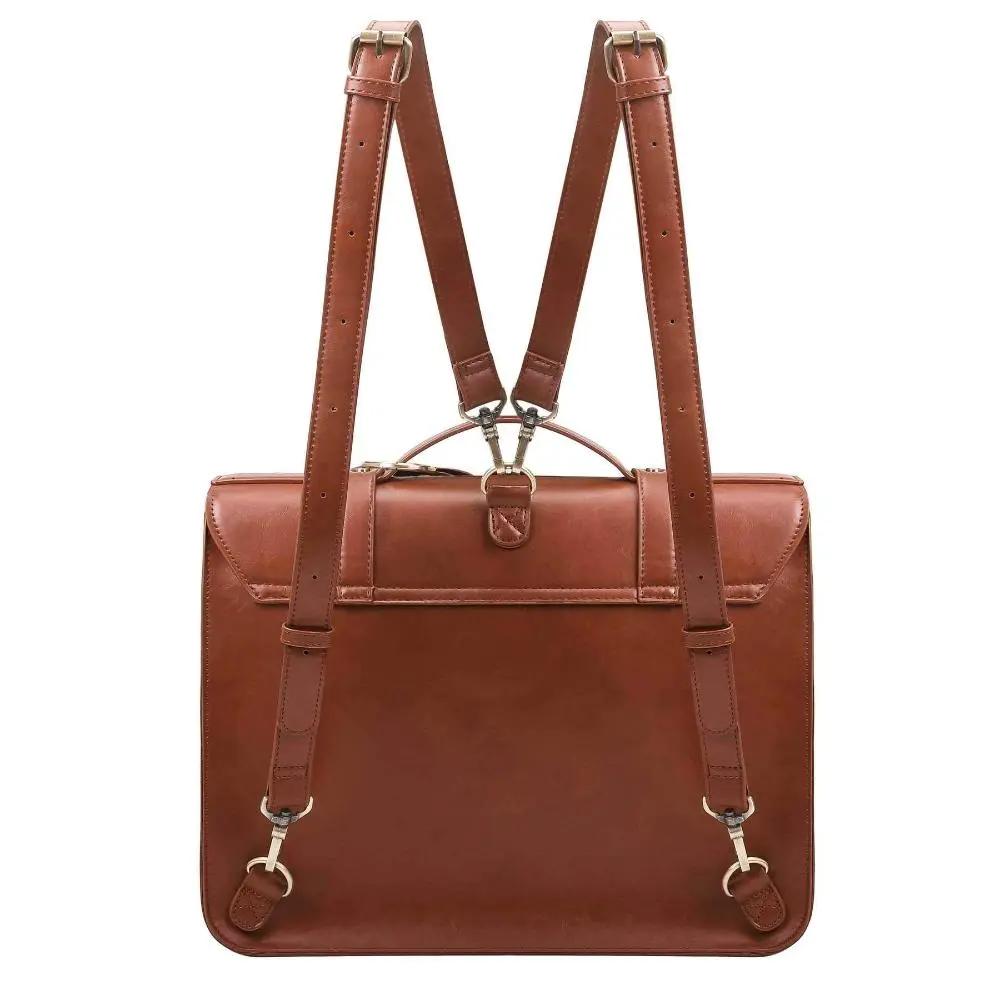 Sac rétro Knoten Twist en bleu-rose de Danoir Paris, élégant sac à main vintage avec design torsadé et détails colorés.