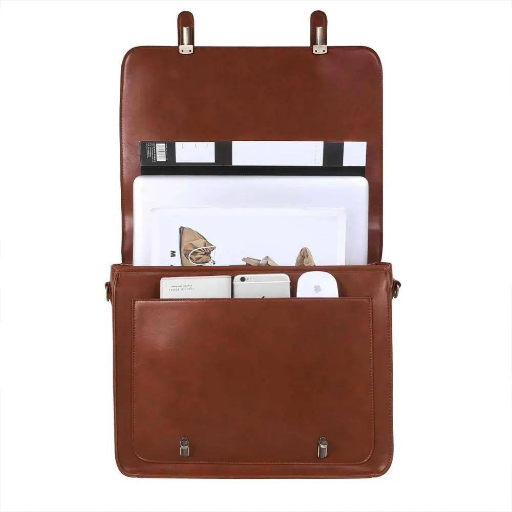 Sac retro twist Knoten de Danoir Paris en bleu et rose, en cuir avec design vintage et poignée courte.
