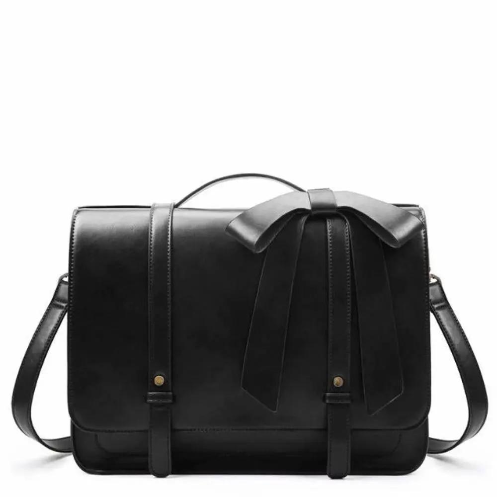 Sac retro twist Knoten en bleu-rose de Danoir Paris, en cuir avec design vintage et poignées élégantes.
