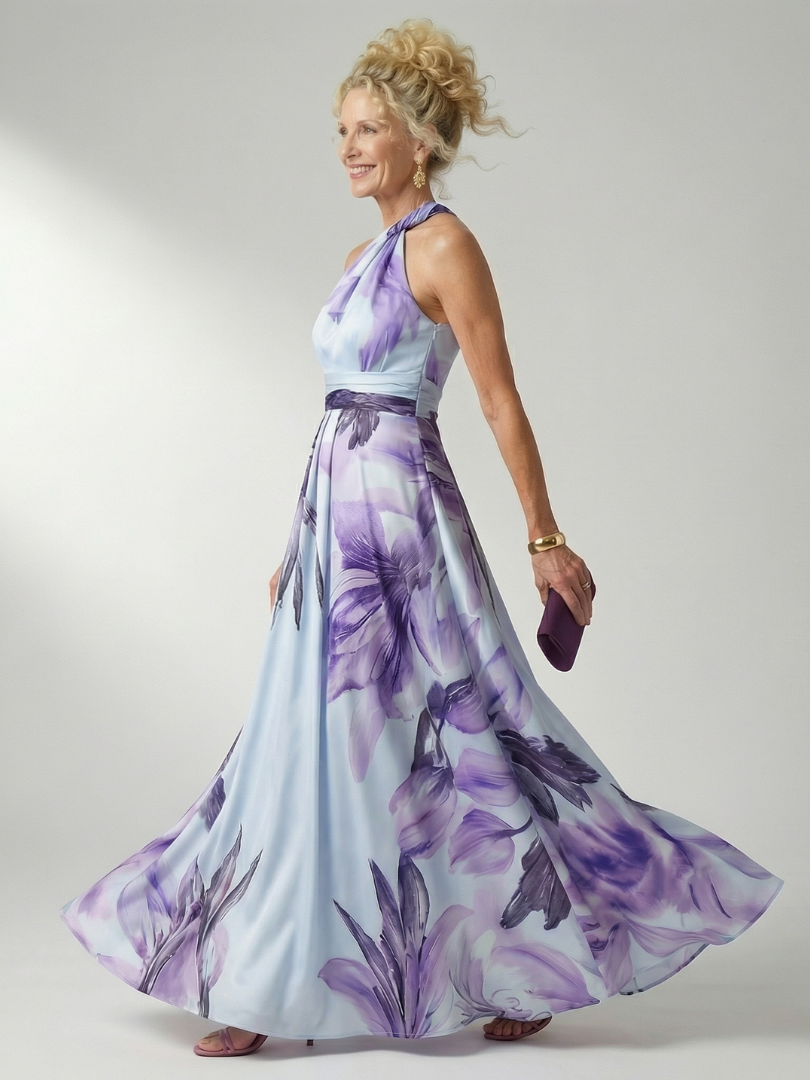 Robe longue florale légère Amiel de Danoir Paris en tissu blanc, portée avec détails délicats et élégants.