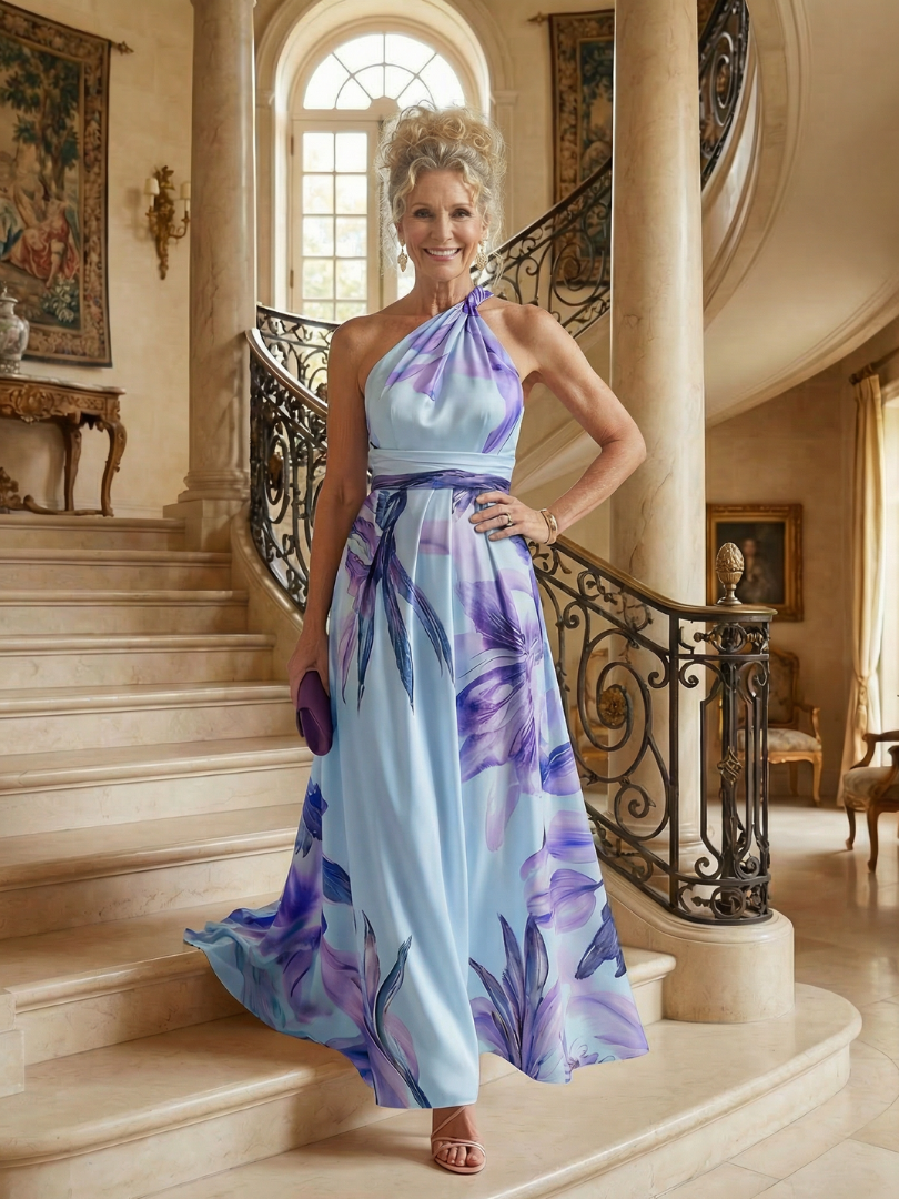 Robe longue fluide Danoir Paris Amiel en tissu léger à motifs floraux blancs, idéale pour un look élégant et féminin.