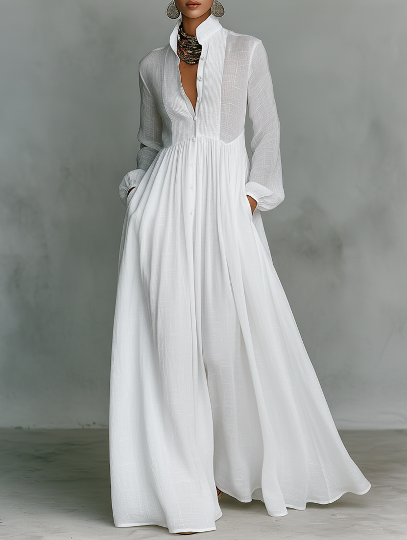 Robe longue fluide blanche Danoir Paris Serena avec bouton devant, tissu léger et élégant.