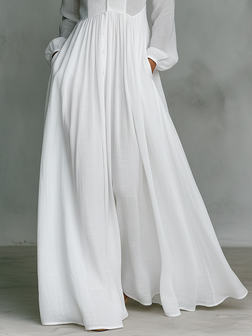 Robe maxi fluide blanche Danoir Paris Serena avec boutons à l'avant, robe longue élégante pour femme.