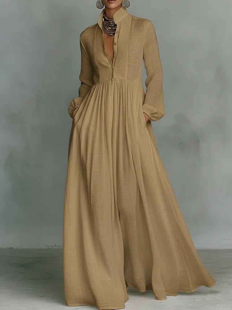 Robe longue fluide blanche Danoir Paris Serena avec bouton devant, silhouette élégante et tissu léger.