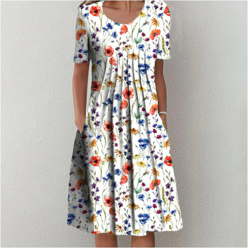 Robe midi élégante pour femmes Danoir Paris, style aéré avec motif floral multicolore, taille XS.