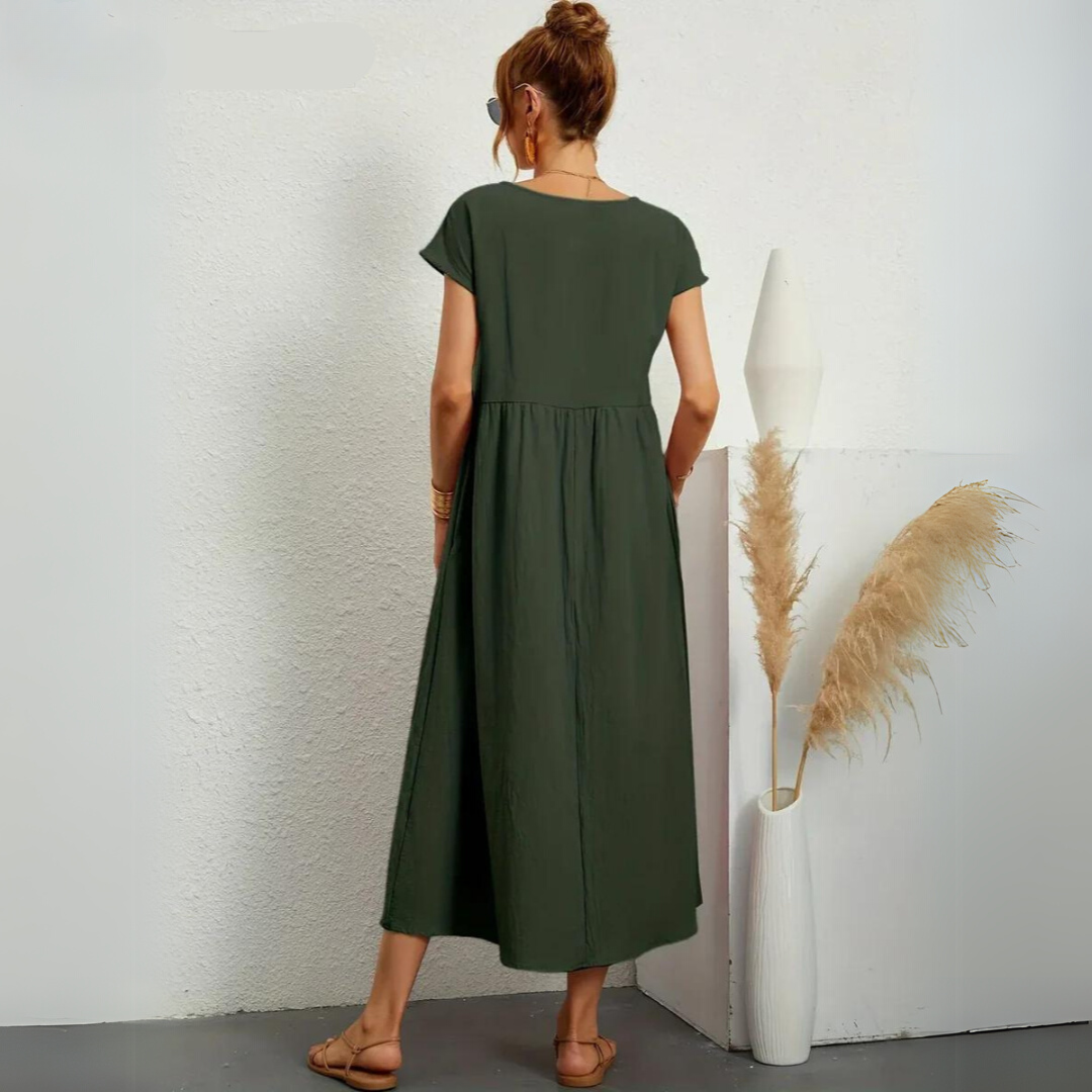 Robe midi décontractée en coton blanche pour femme, marque Danoir Paris, avec coupe fluide et détails simples.