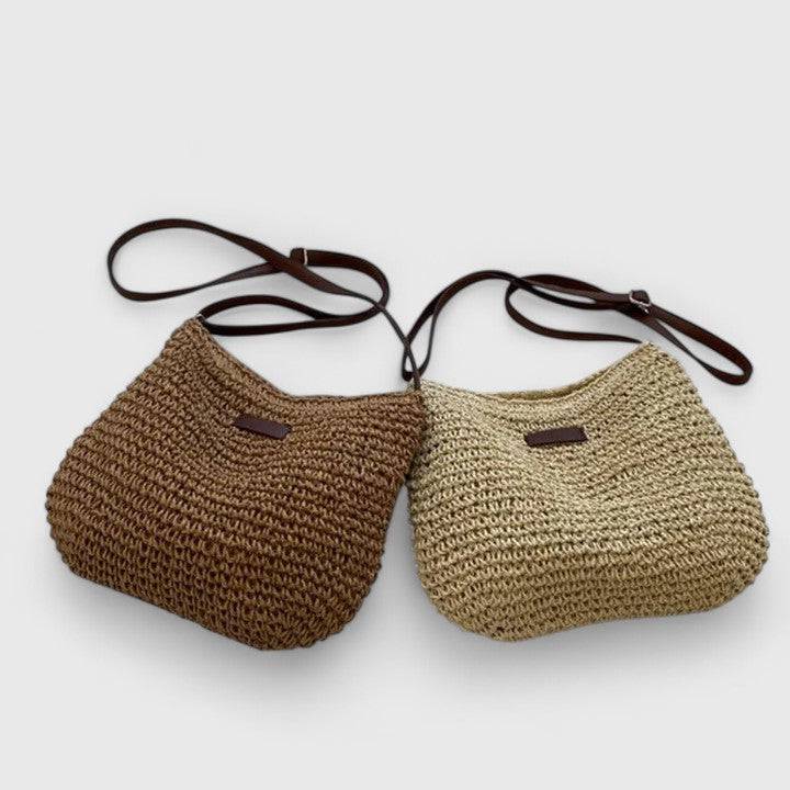 Sac élégant Kathy de Danoir Paris en cuir avec poignées et détails sophistiqués, vue de face sur fond neutre.