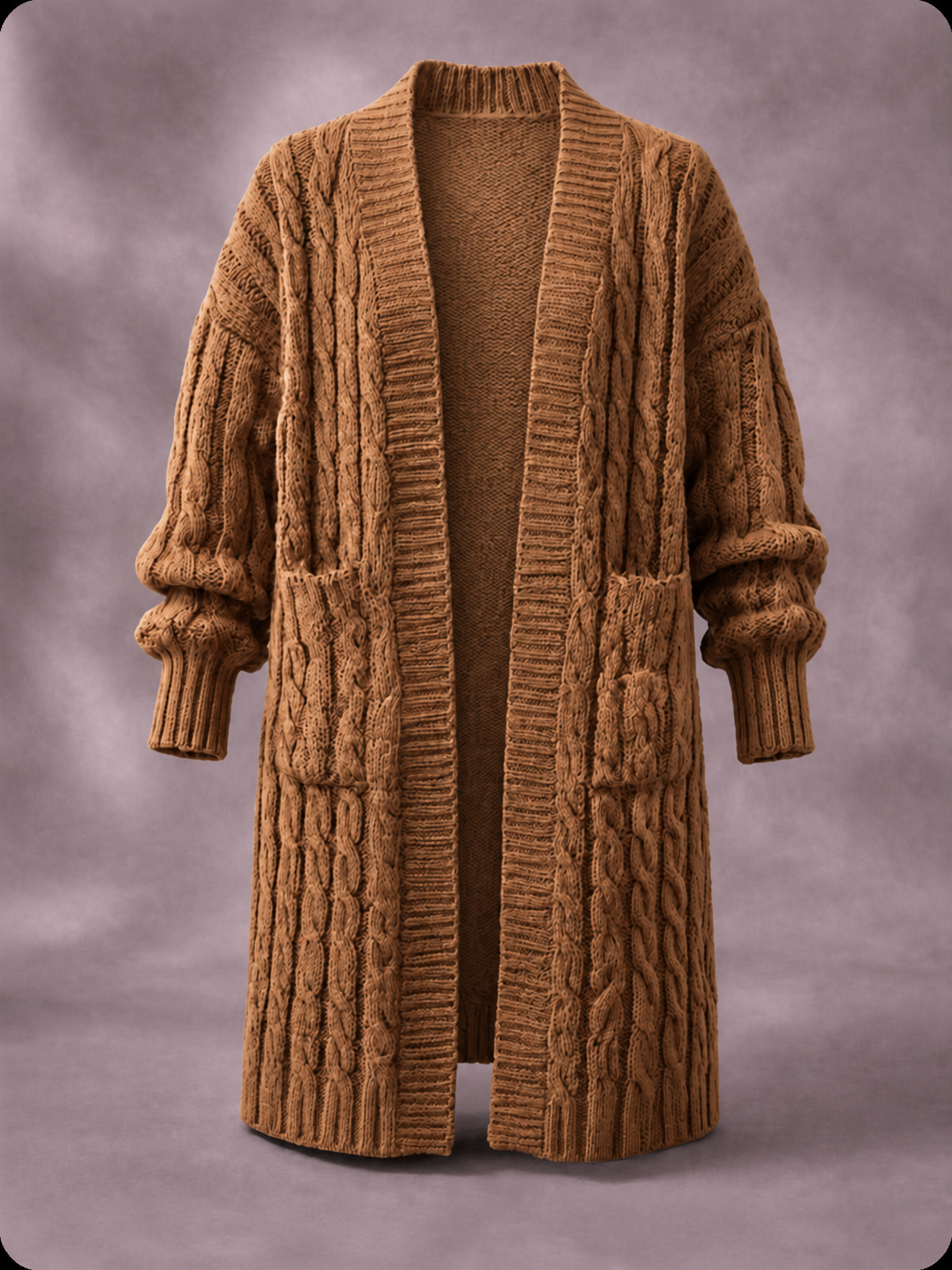 Cardigan en maille à double boutonnage Danoir Paris porté par-dessus une chemise, avec col classique et manches longues.
