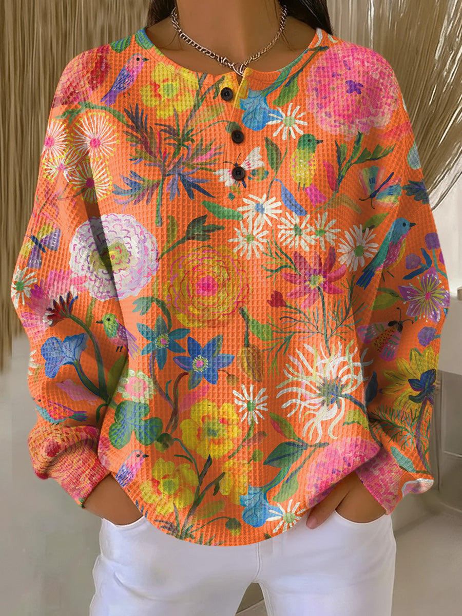 Pull féminin Freja de Danoir Paris avec imprimé floral coloré, vue de face, en maille douce et confortable.