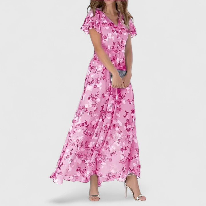 Robe longue Evelyn de Danoir Paris, robe maxi élégante en tissu fluide, portée avec style et sophistication.