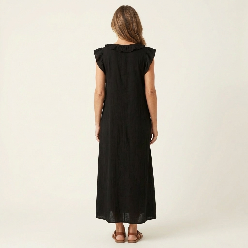 Robe maxi Danoir Paris Josette à col V avec volants, longueur longue, tissu fluide et détails élégants.
