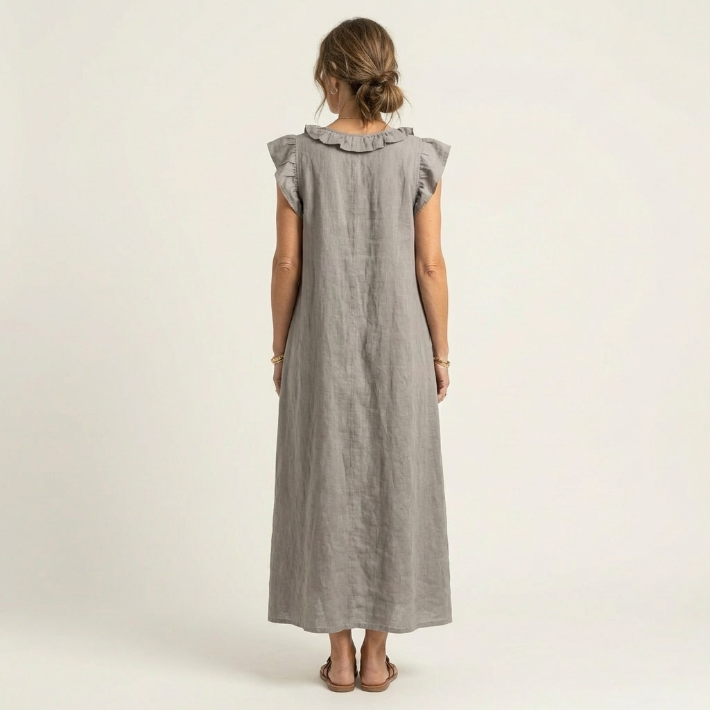 Robe maxi Josette à col V avec volants, robe longue élégante de Danoir Paris, tissu fluide et détails féminins.