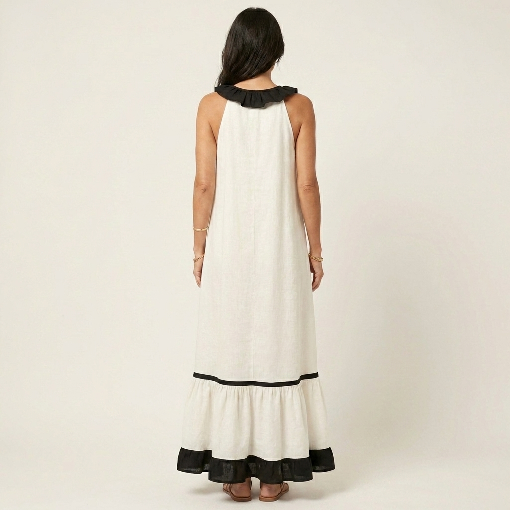 Robe longue sans manches Danoir Paris, maxi avec col volanté contrasté et finitions élégantes, style chic et moderne.